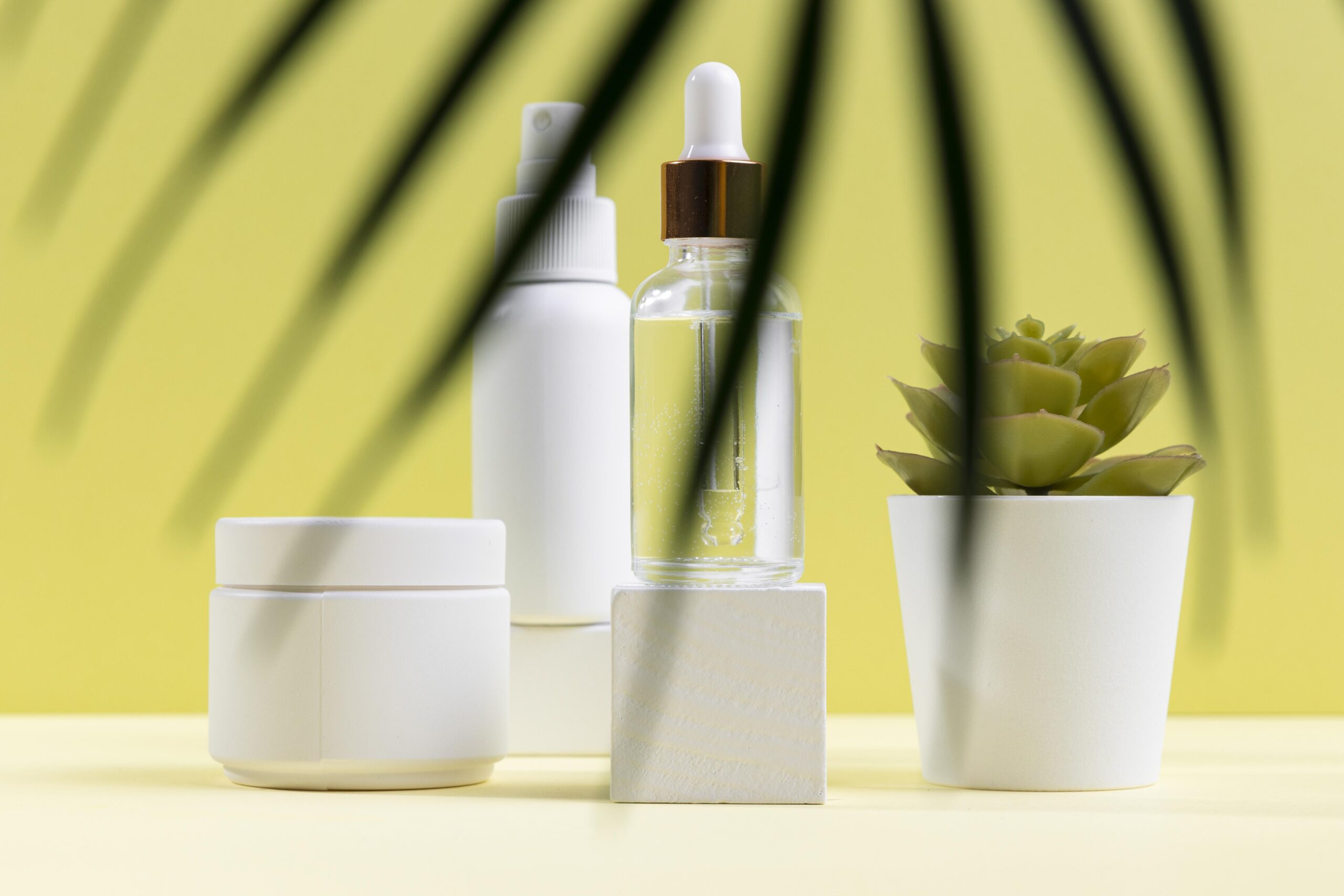 Flat lay of 7 best preppy skincare brands featuring chic packaging and stylish skin care products arranged neatly on a vanity table